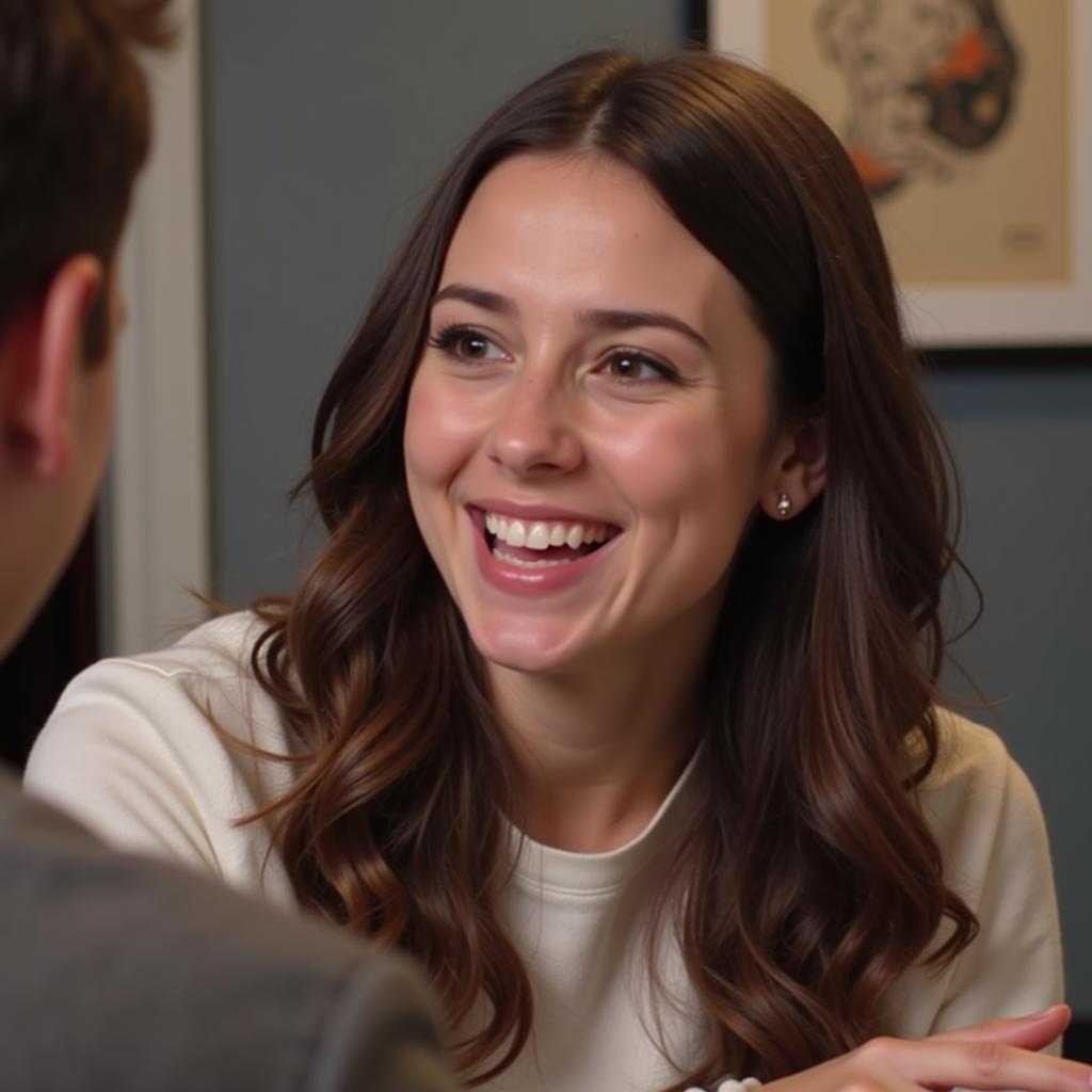 A woman smiling and talking about her hobbies